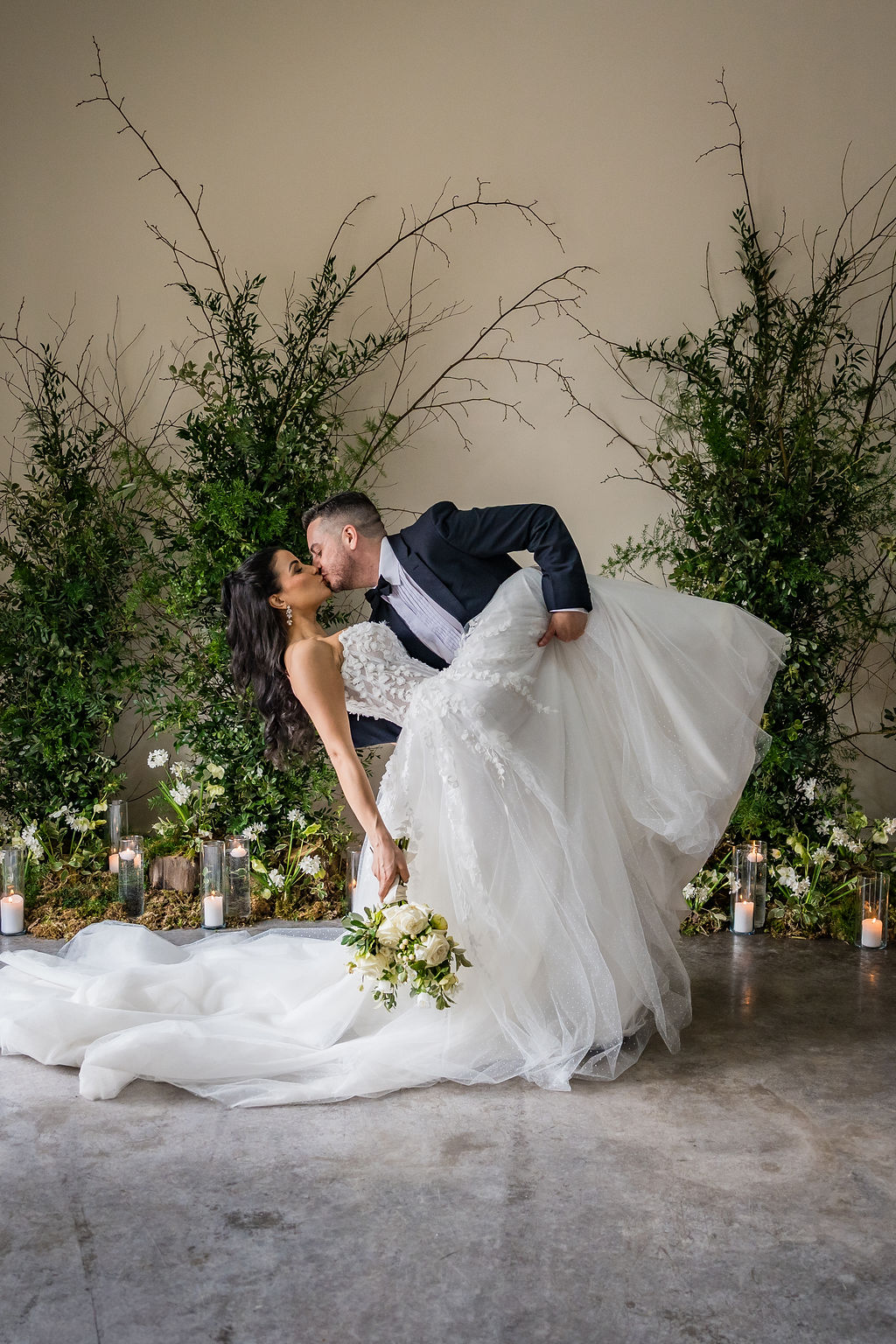 Couple’s Kiss in The Arches at Kinclune House & Estate. Dress by The Hitching Post Bridal. Photography by ZibiZPhoto.