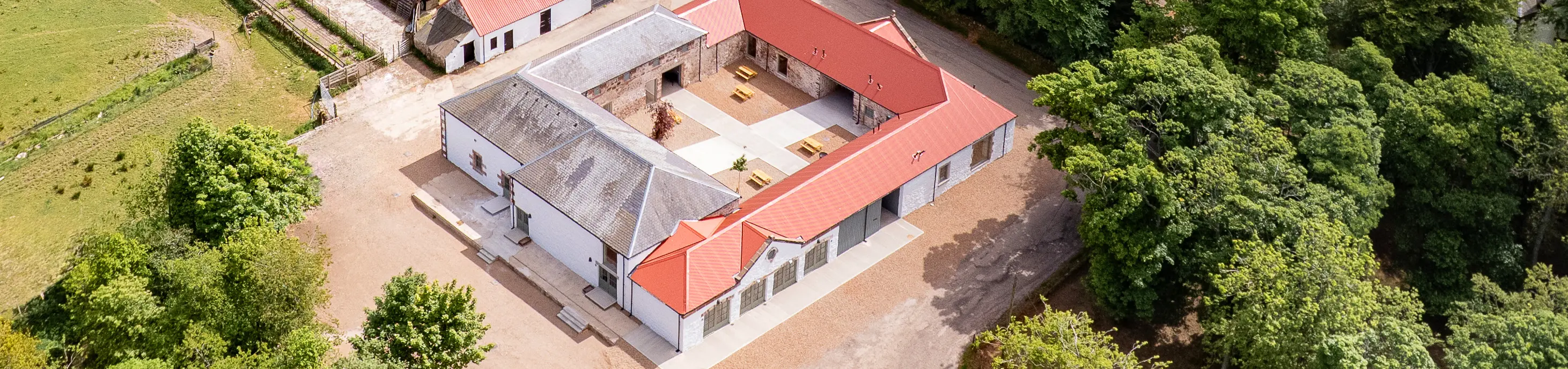 Aerial view of Kinclune Steading and Victorian Courtyard venue in Angus