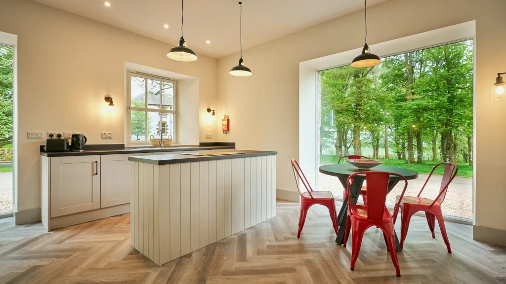 Curlew Cottage modern and spacious kitchen dining area with woodland view