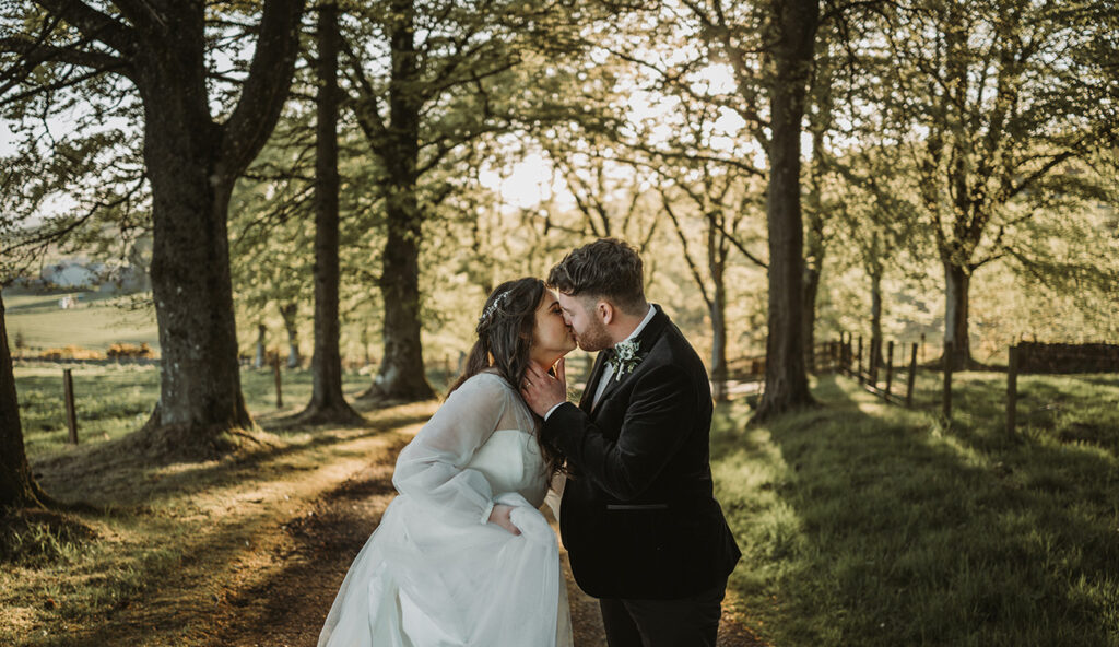 Newly married Holly and Dan as the sun is setting on Kinclune Estate - Sam Pitt Photography