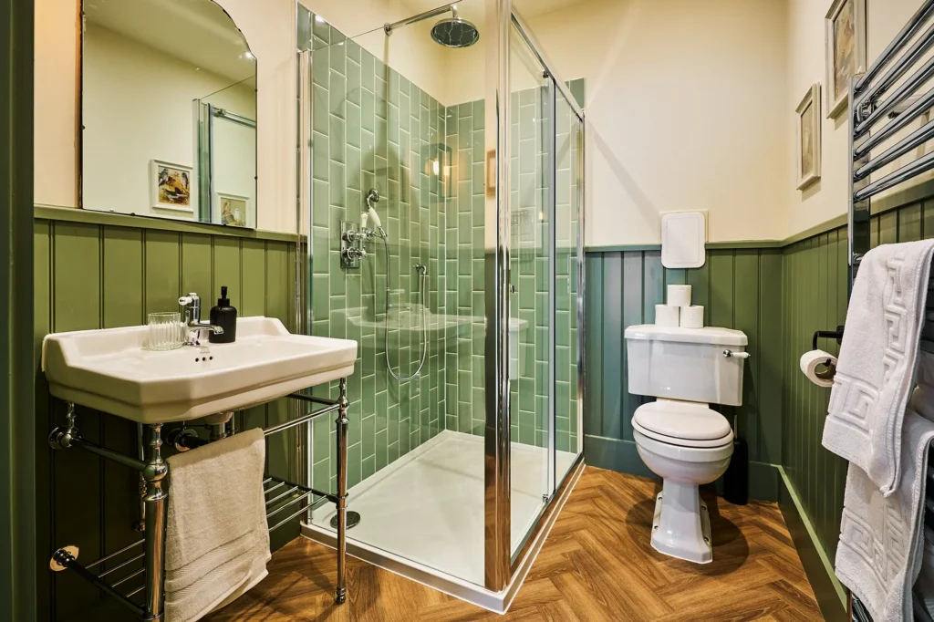 Spacious shower and shower room combining modern facilities and heritage chic.