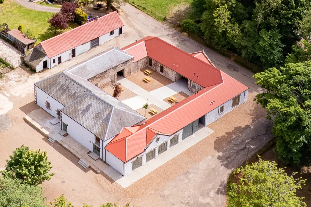 Kinclune Steading with 2 event spaces (The Arches and The Barn), 2 cottages (Curlew and Kestrel), and a Victorian courtyard with outdoor seating, festoon lighting and fire pits