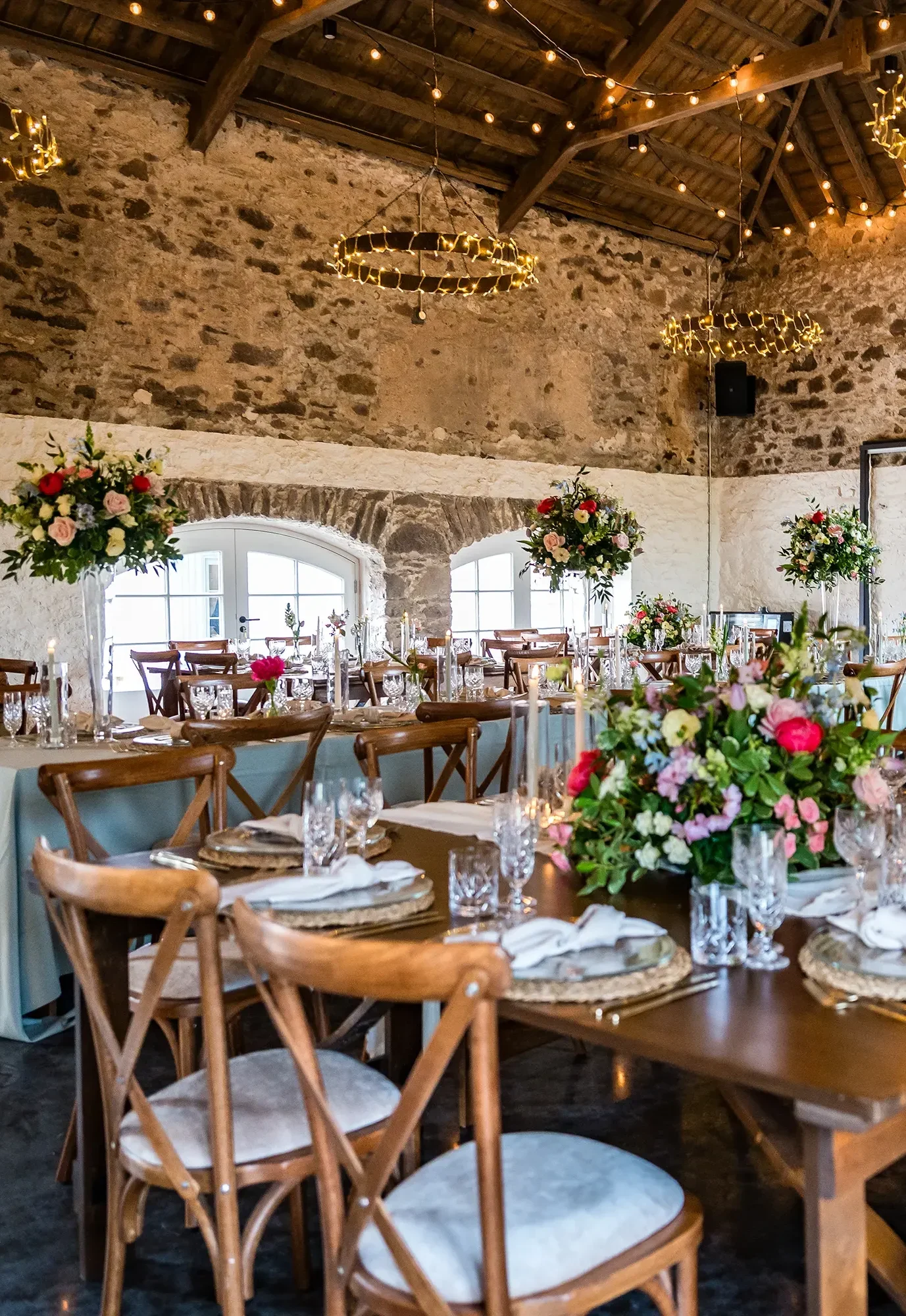 The magnificent party barn at Kinclune Steading with soaring vaulted ceiling and charming original features. The perfect backdrop to your wedding celebration.