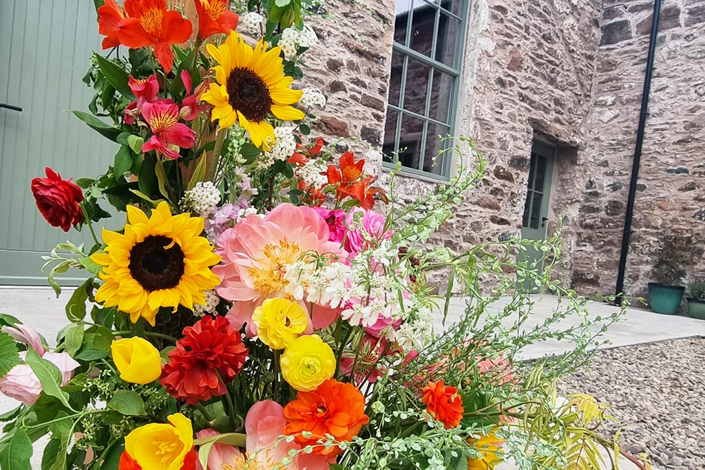 Kinclune Steading courtyard set with beautiful, locally grown wedding flowers