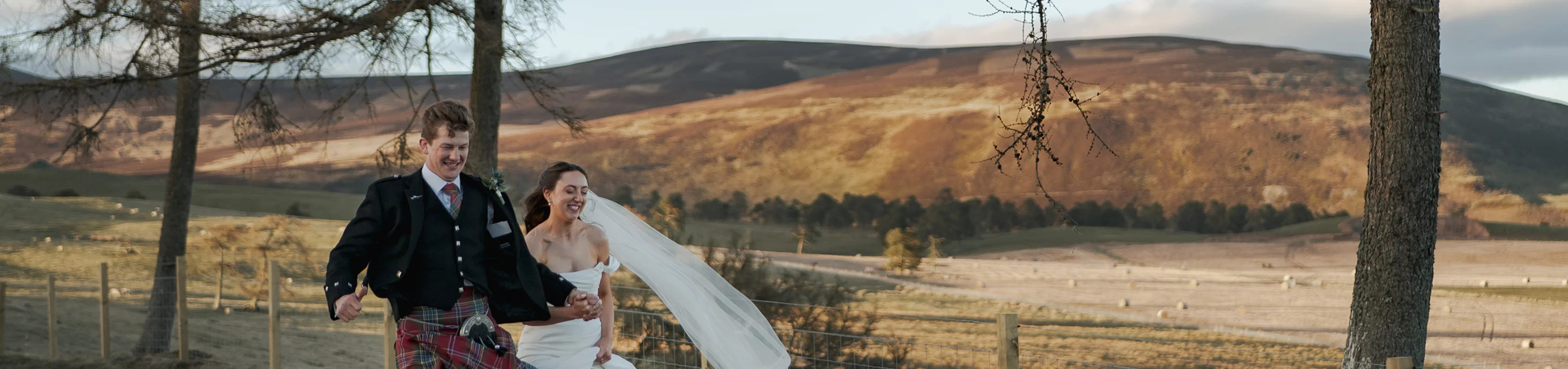 Rebecca and Charlie's wedding celebration, immersed in the rural landscape at Kinclune Estate in Angus, Scotland